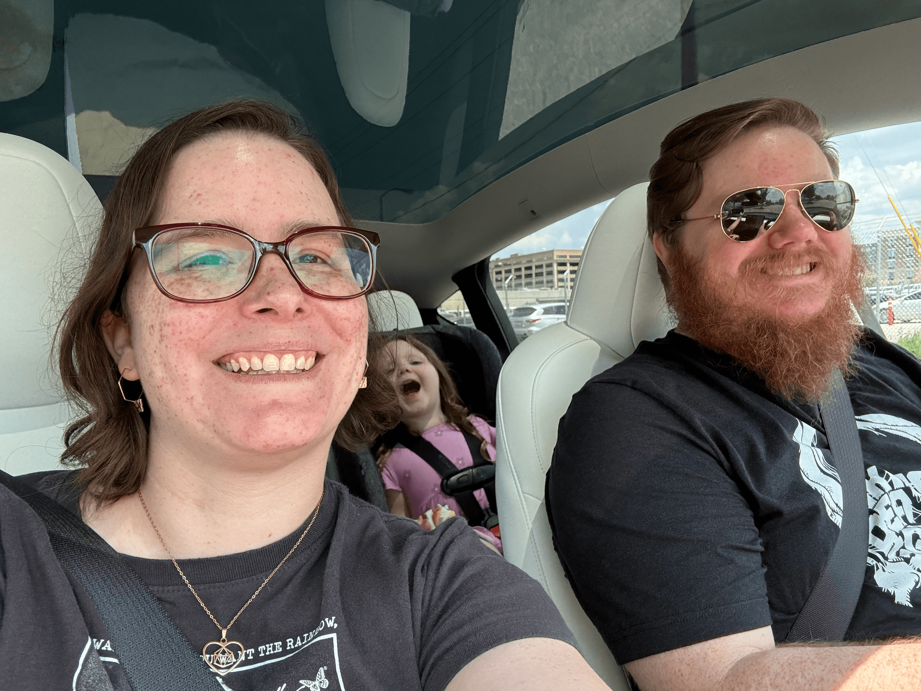 Stephen, Jaleesa, and their daughter on their way to GenCon '24